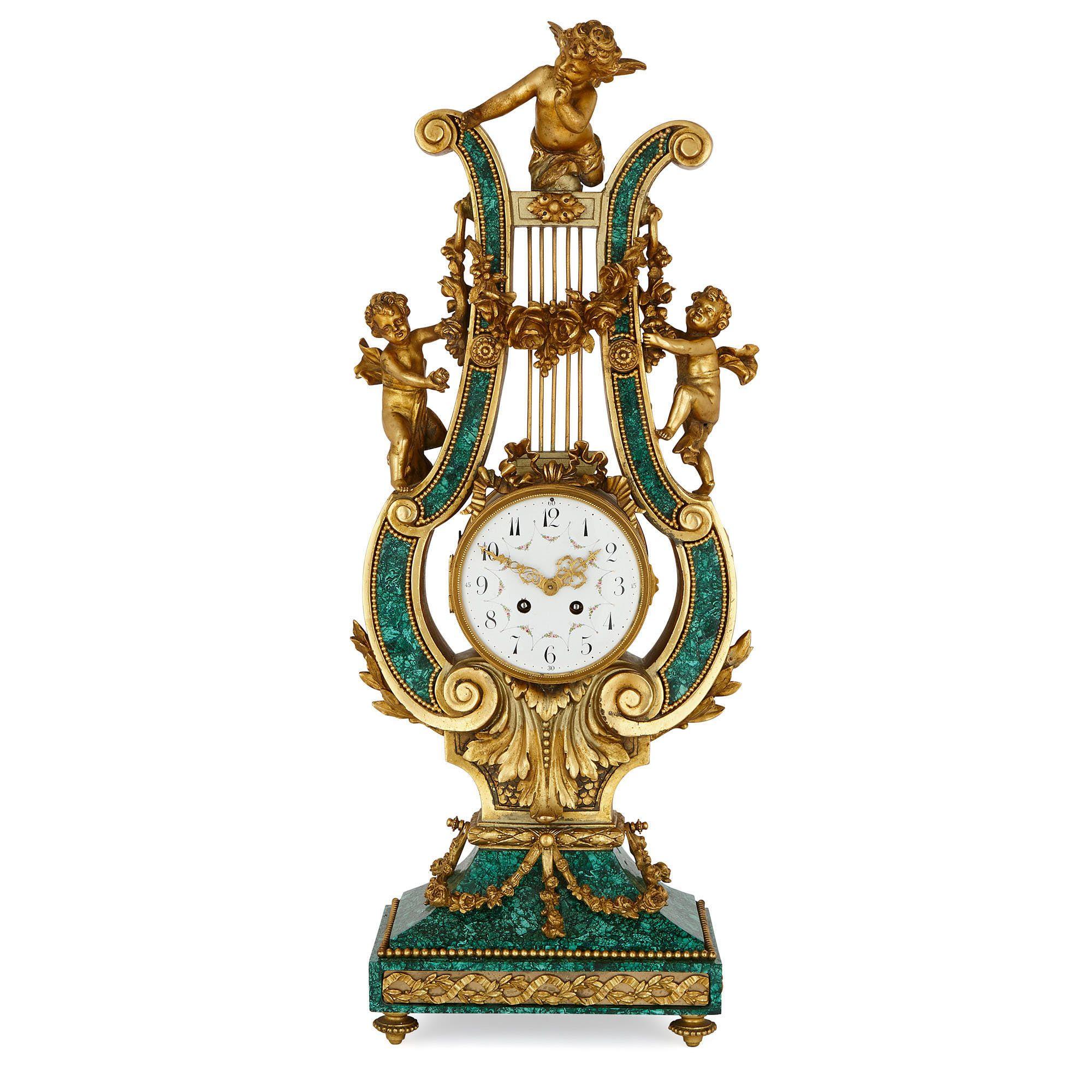 Harp Shaped Logo - Gilt bronze and malachite harp shaped mantel clock 1900 to 1949