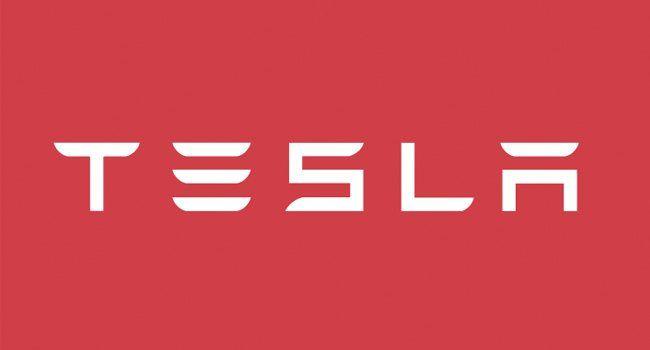 Tesla Red Logo - tesla-logo-red-white-650w | Woman And Wheels
