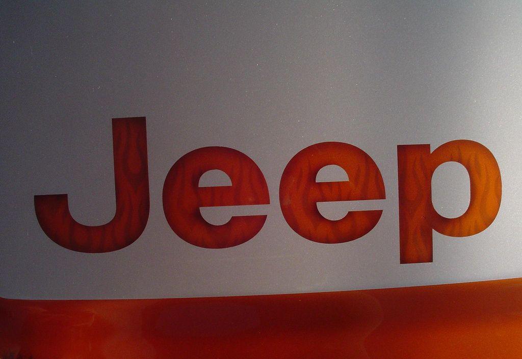Orange Jeep Logo - Jeep Wrangler orange hood logo flames. The Jeep logo painte