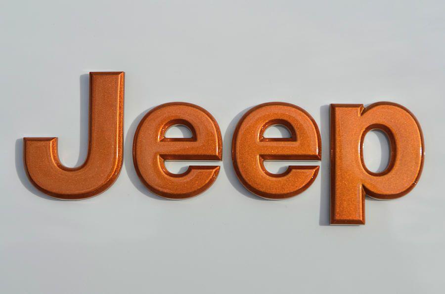 Orange Jeep Logo - Jeep Logo Photograph by Nate Heldman
