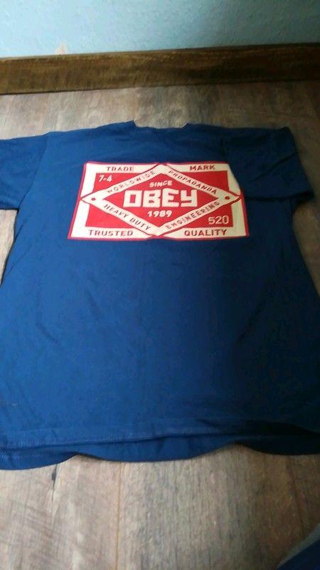 Blue Obey Logo - Men's navy blue logo t-shirt by Obey - Vinted