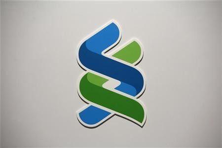 Standard Chartered Logo - Standard Chartered share price up after another year of record profits