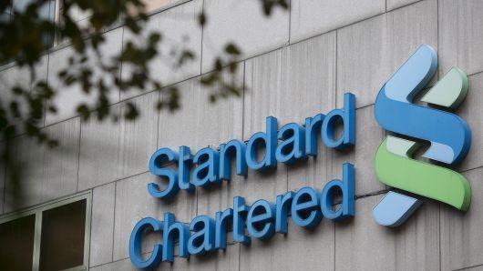 Standard Chartered Logo - Standard Chartered to scour records for money laundering