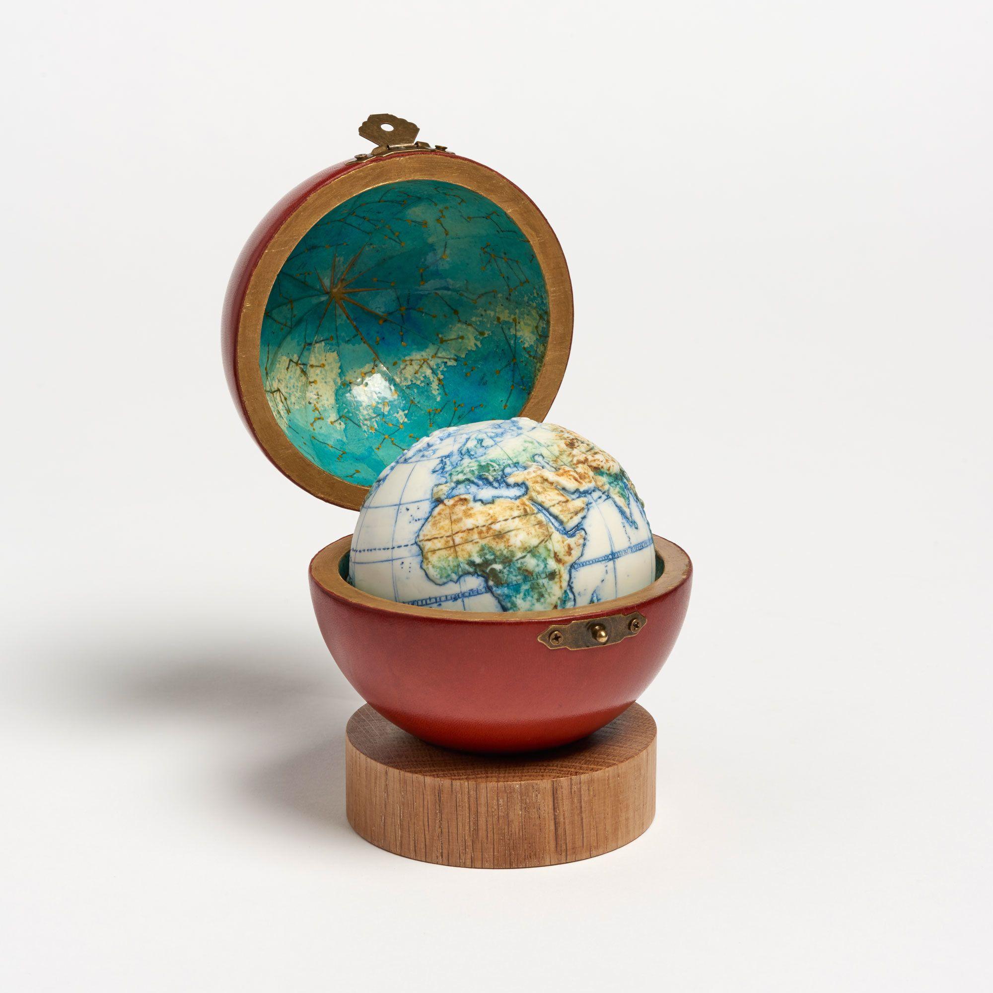 Hands-On Globe Company Logo - Land and Sea Ceramic Hand-Painted Globe | The Garnered