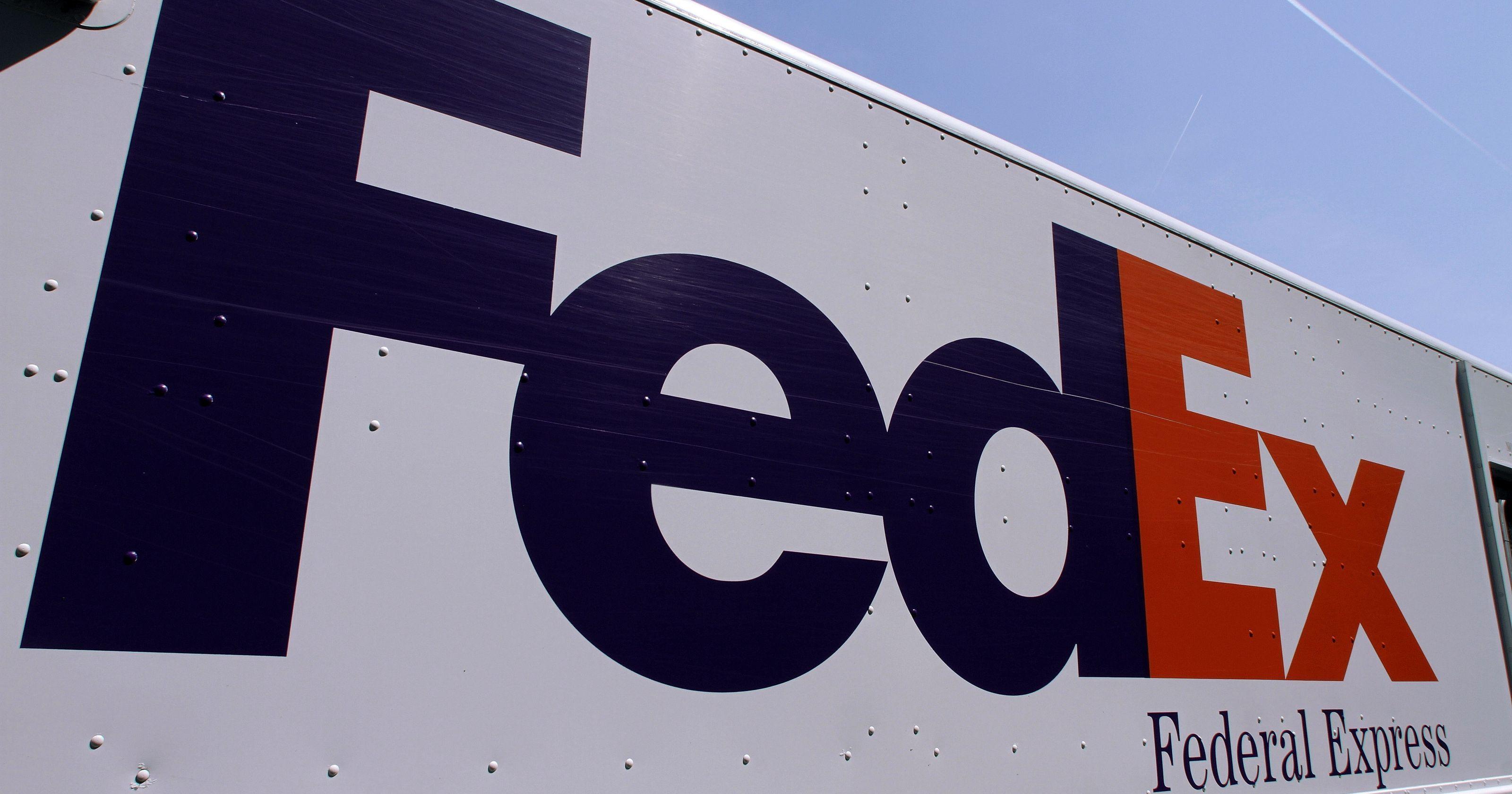 People Service Profit FedEx Logo - Investors applaud FedEx cost-cutting plan