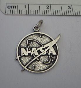 Silver NASA Logo - says Nasa 