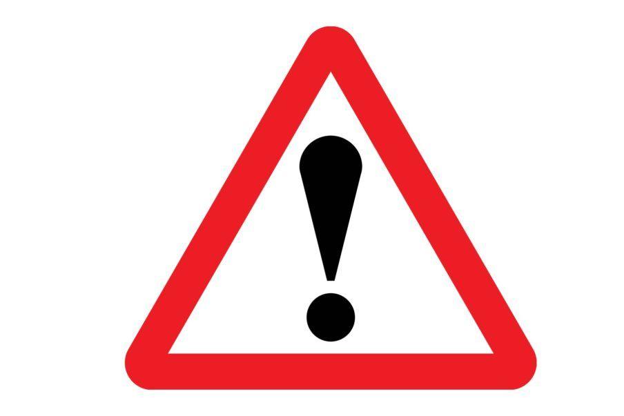 White with Red Triangle Inside Circle Logo - of the most confusing road signs in the UK