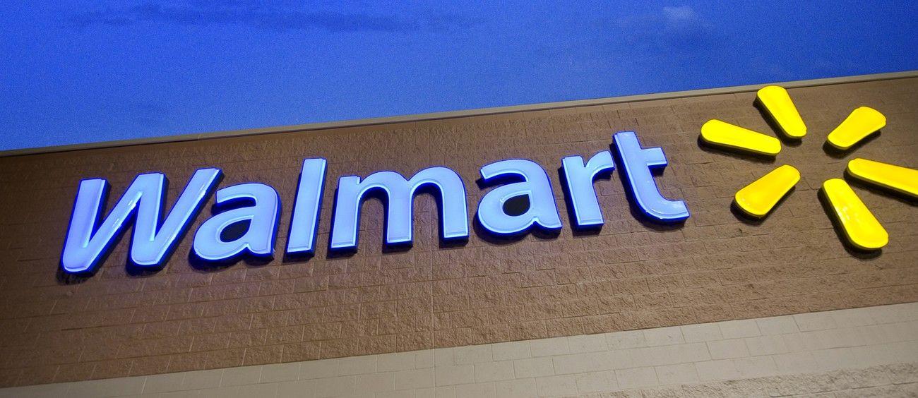 Old Walmart Logo - Our History